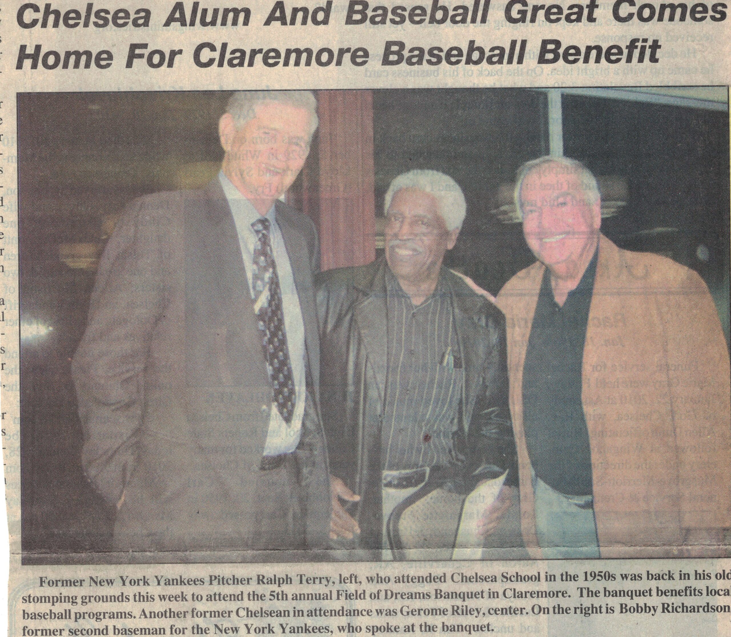 Picture of three men standing together with article title overhead and caption below.